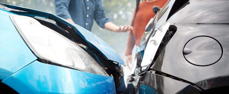 Uninsured driver speaking with woman in Washington, D.C.