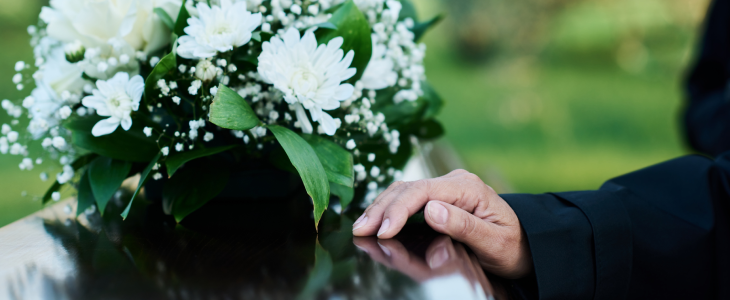 Casket with flowers on top