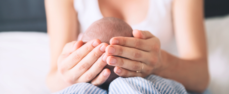 Mother holding her child